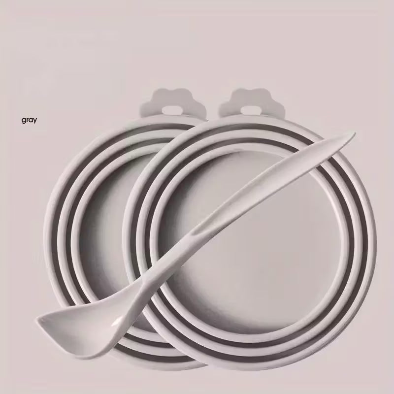 Juego de 2 tapas de silicona y 1 cuchara para conservación de alimentos.